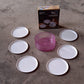Plastic coasters effectively safeguarding furniture from hot beverage marks and spills.