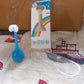 Packaging of the MintGuard Kids 3-Sided Toothbrush, ready for gifting.