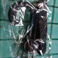 Stroller hook product showcasing its compact size and design.