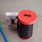Close-up of the robust plastic material and sturdy construction of the retractable folding stool.
