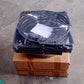 Vertical metal mesh storage rack with 4 rotating caster wheels for easy mobility