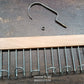 Organivo 8-hook wooden hanger specifically designed for organizing ties and belts.