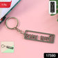 Close-up metal charm of Gujarati text devotional keychain