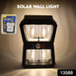 Close-up of the sleek black Solar Wall Lantern mounted on a wall.