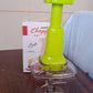 Various fresh vegetables chopped and ready, placed next to the CookAura manual vegetable chopper.