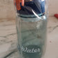 Portable 600ml leak-proof plastic water bottle ideal for travel