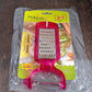 Peeling potatoes using the stainless steel 2-in-1 kitchen peeler and grater tool