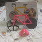 The complete Quickslice Bicycle Pizza Cutter showcasing its innovative design.