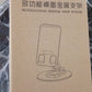 The compact rotating mobile stand displayed from the front, illustrating its minimal footprint on a desk.