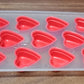 Refreshing drinks garnished with creative fruit ice cubes.