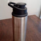 The Own Hydrate steel water bottle displayed against a clean background, highlighting its minimalist design.