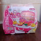 Child pulling the closed portable kids kitchen play set suitcase