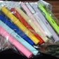 Everlasting magic pencil displayed with writing samples and accessories