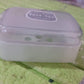 Durable plastic soap dish with a simple pattern, designed for longevity.