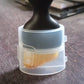 Upright display of the mini car interior cleaning brush.