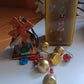 Peaceful garden setting with hanging dragonfly wind chime visible