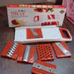 All components of the Quickslice kitchen food prep tool laid out.