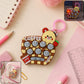 Unicorn fidget popper keychain toy with nine popper bubbles attached to a clip