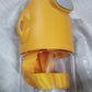 The portable water bottle with its adjustable strap hanging from a backpack, ready for travel.