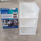 Stackable and foldable 3-layer clothes organizer, ideal for closet and drawer use.