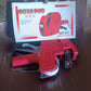 The 8-digit Price Tag Gun in its packaging, ready for use in a retail or market setting.