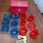 A collection of the plastic candle holders from the Indo Glow Diwali Diya Set.
