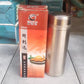 Angled view highlighting the premium finish of the stainless steel flask.