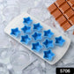 Close-up of a flexible silicone mold, showing perfectly formed fruit-shaped ice cubes ready for release.
