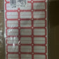 Close-up of blank label sheets designed for easy writing and sticking