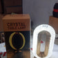 The sleek design of the crystal table lamp from a side view.