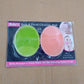 Two silicone cleansing brushes in different colors, packaged together.