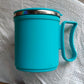Lifestyle shot of an insulated coffee mug on a desk, perfect for office use.