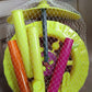 The durable plastic construction of the light-up single wheel push toy.