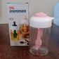 Modern kitchen setting featuring the 2-in-1 oil dispenser with silicone brush.