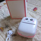 Back view of the Voltronic Pocket Mini Printer, showing its minimalist design.