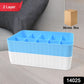Close-up of a compact drawer organiser with individual compartments for socks and undergarments.