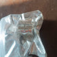 Portable folding multi-finger fidget ring captured in an outdoor setting, emphasizing its travel-friendliness.