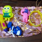 The Aditi Kids Toy Combo packaging, showing the Potli bag and a glimpse of toys.