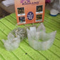 Packaging for the Indo Glow 12 Diya Curtain String Lights.