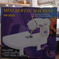 Top-down view of the compact sewing machine with its thread setup.