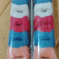 Close-up of small hair claw clip in plush texture for firm hold