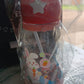 Alternative angle of kids cartoon water bottle with antler cap and strap