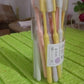 The complete 20-piece soft plastic toothbrush set with its clear portable round storage box.