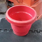Eco-friendly plastic plant pot, 13cm, offering a lightweight yet sturdy solution for gardening.