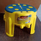 Close up of bubble-textured non-slip seat surface on kids step stool