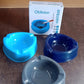 Angled view of plastic ashtray on wooden table