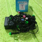 Detailed view of the multi-color LED bulbs on the string lights.