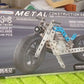 Full set of the Metal Bike Construction Kit showing all parts, tools, and instructions.