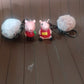 Mix design cartoon keychain featuring a fluffy pom pom accessory