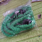 Lifestyle shot of the expandable garden hose being used for car washing.